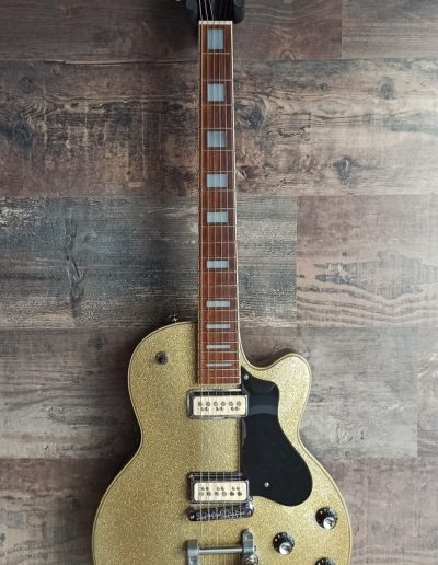 Exposición en pared de guitarra Gretsch Custom Shop Gold Sparkle